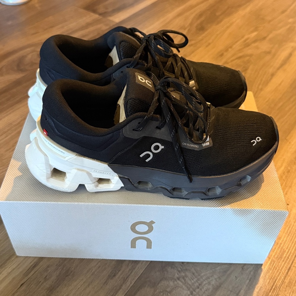 On Running Black and White Athletic Shoes